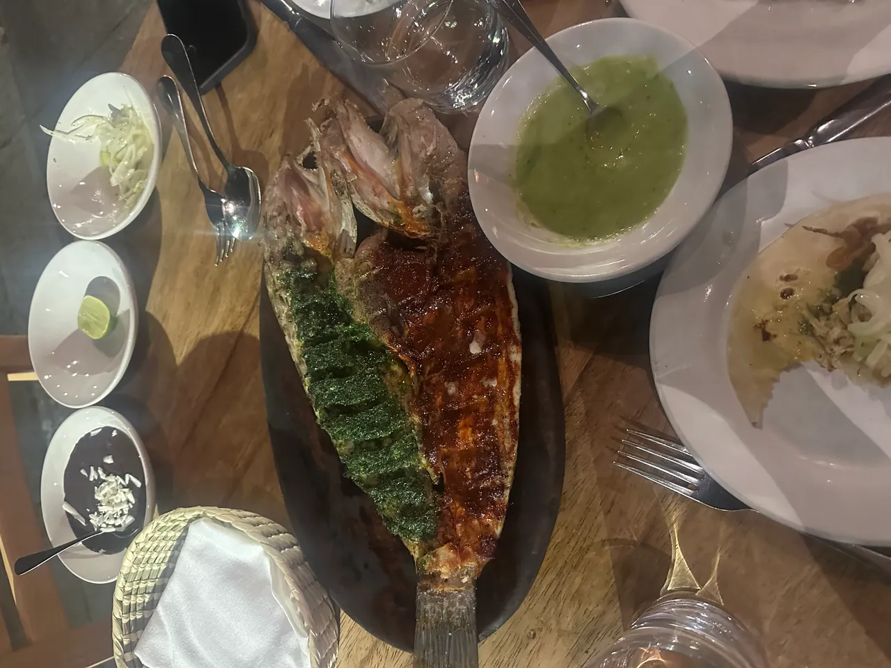 Whole grilled fish at Contramar with herb and chili sauces