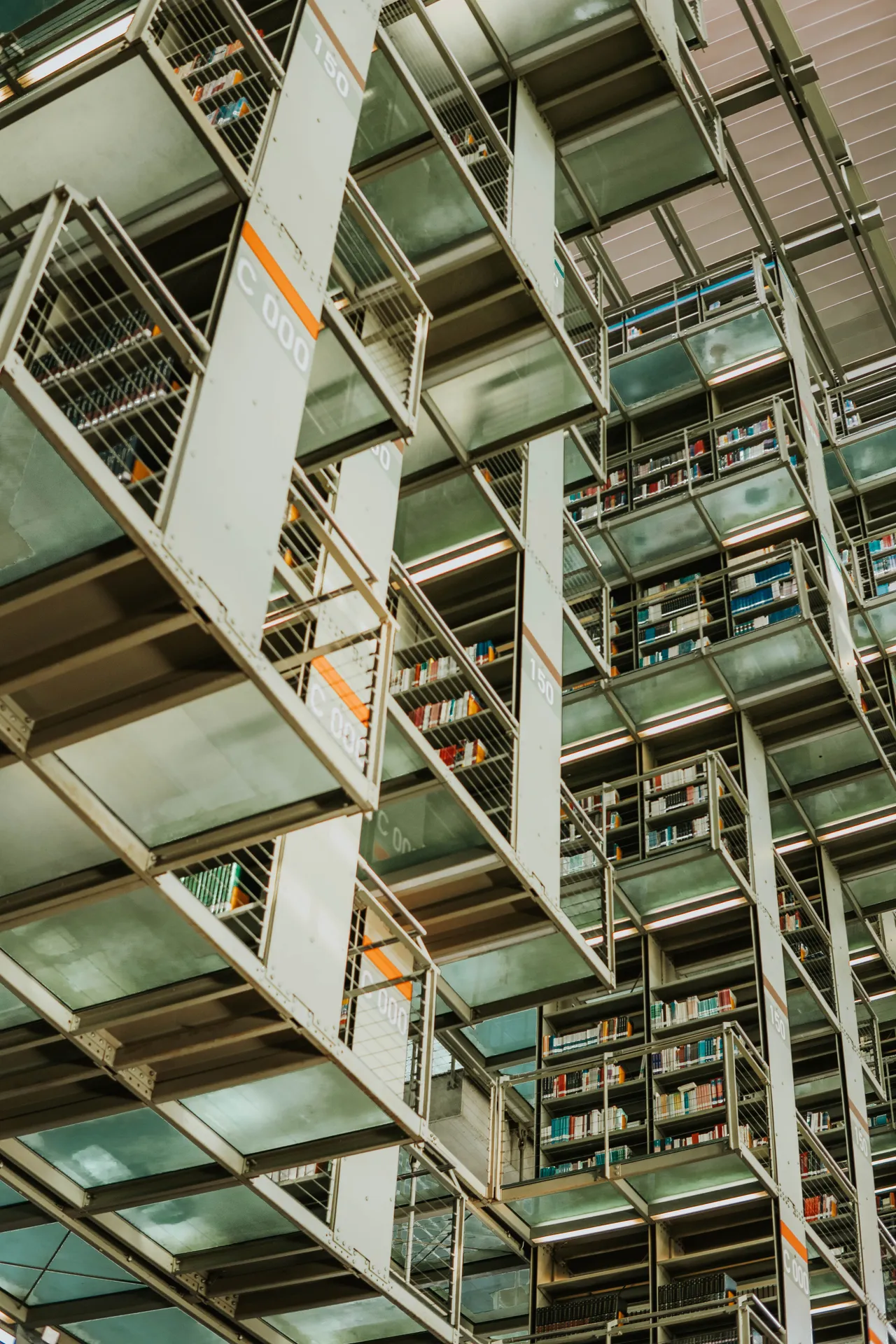Wide view of Biblioteca Vasconcelos interior with visitors walking below