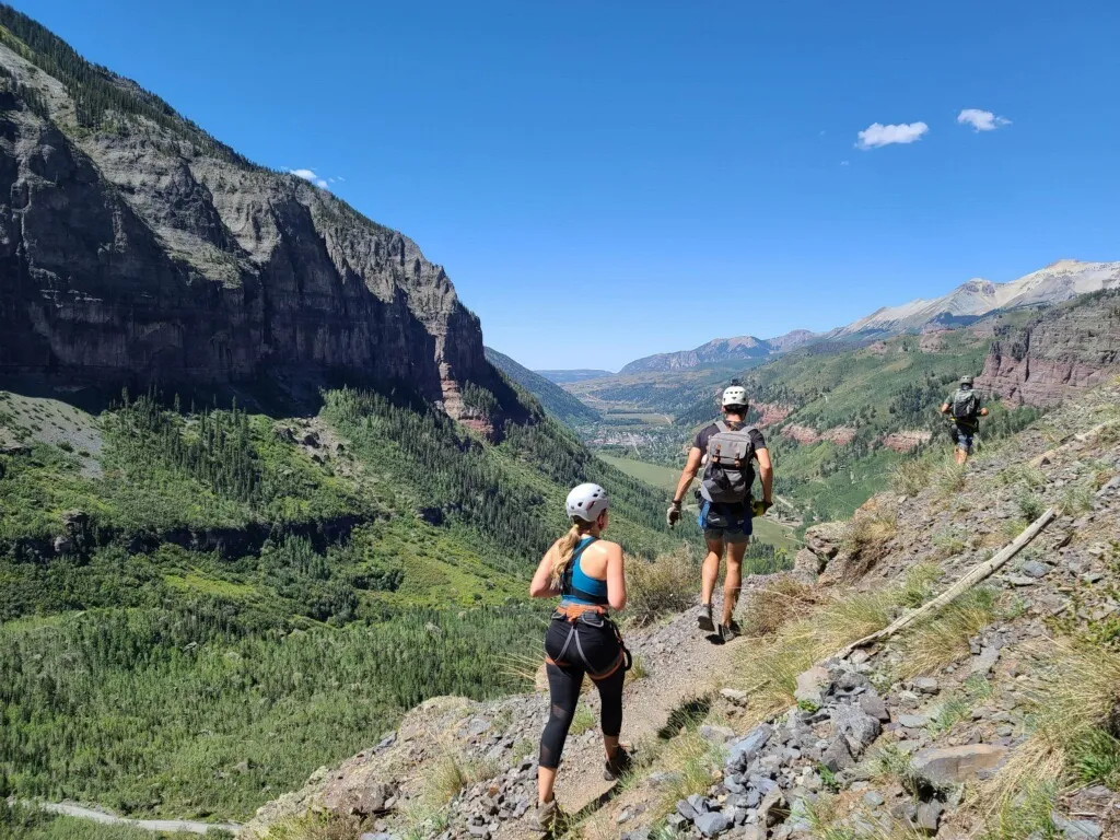 two people hiking in telluride colorado on the via ferrata