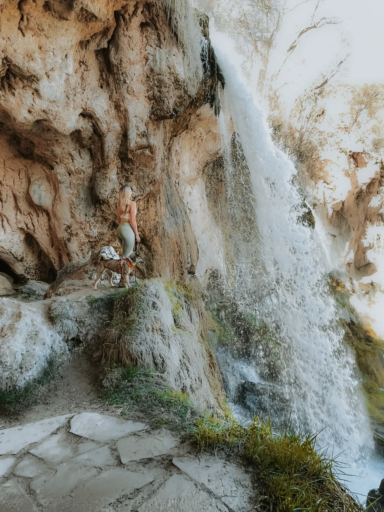 a girl and her dog at rifle falls colorado