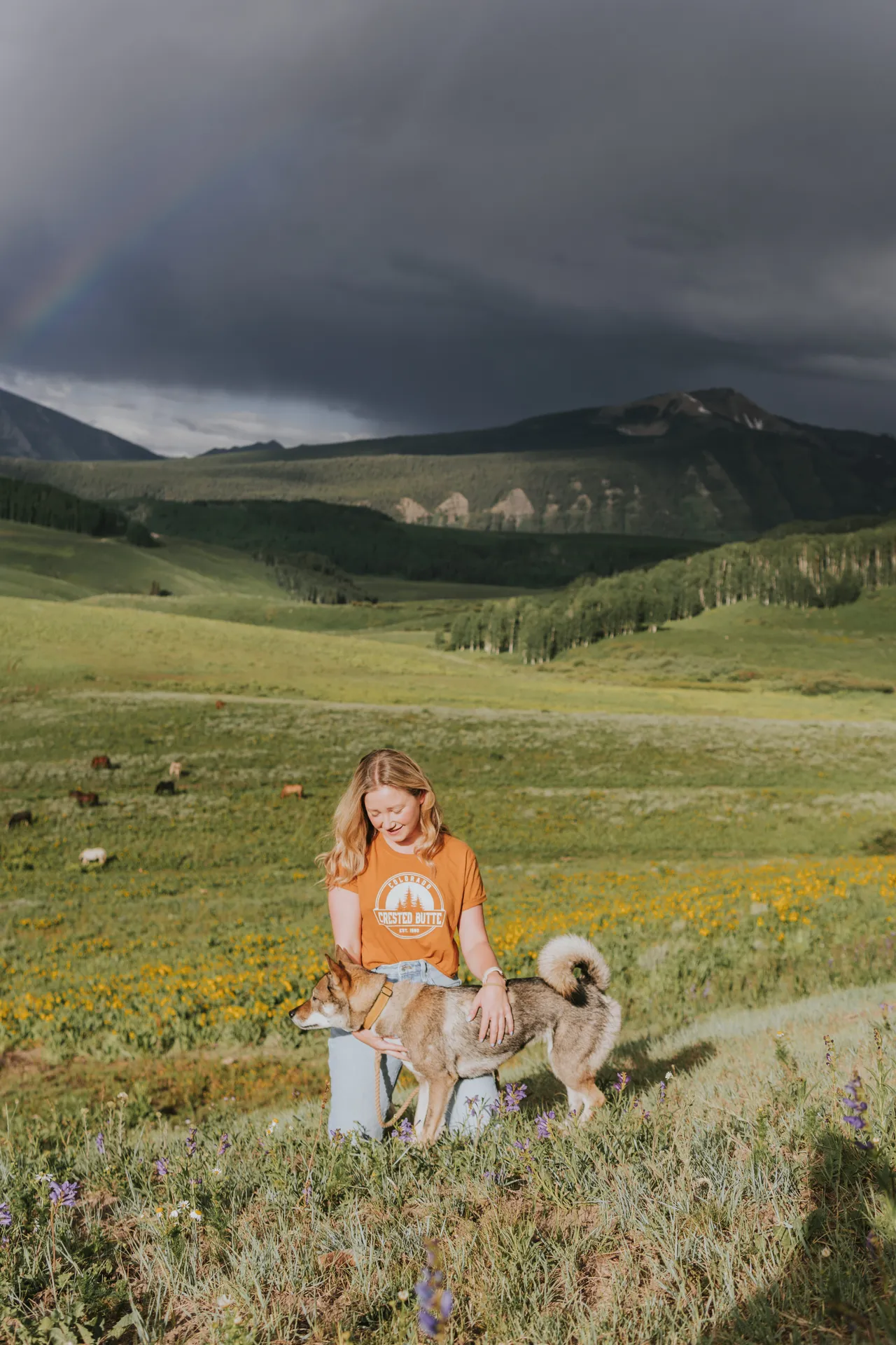 Jackie and Sora in a wildflower meadow in Crested Butte, Colorado