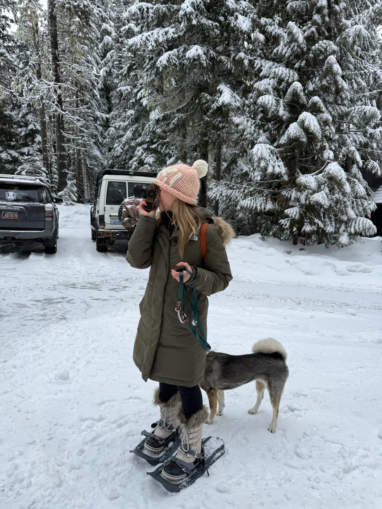 Shooting in a snow-covered forest with a Fjällräven pack