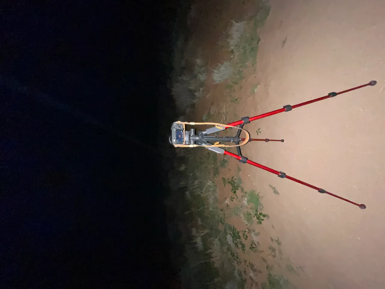 Camera on tripod set up for night photography