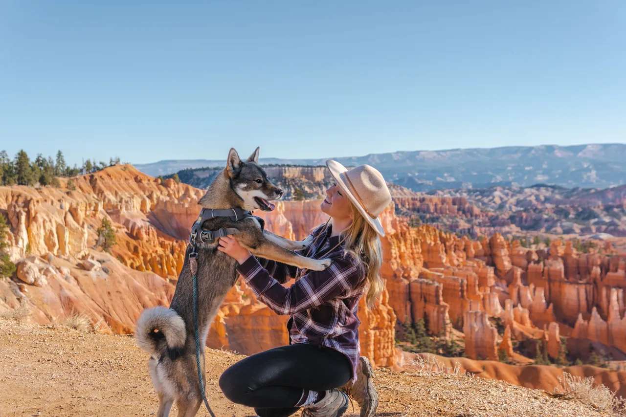 Sora and I at the rim of Bryce Canyon with the orange hoodoos stretching out behind us