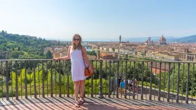 a girl in a white dress in Florence Italy