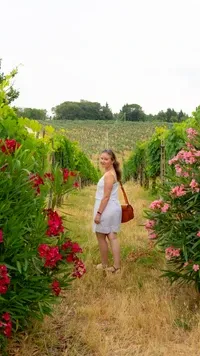 a girl in a dress exploring Tuscany