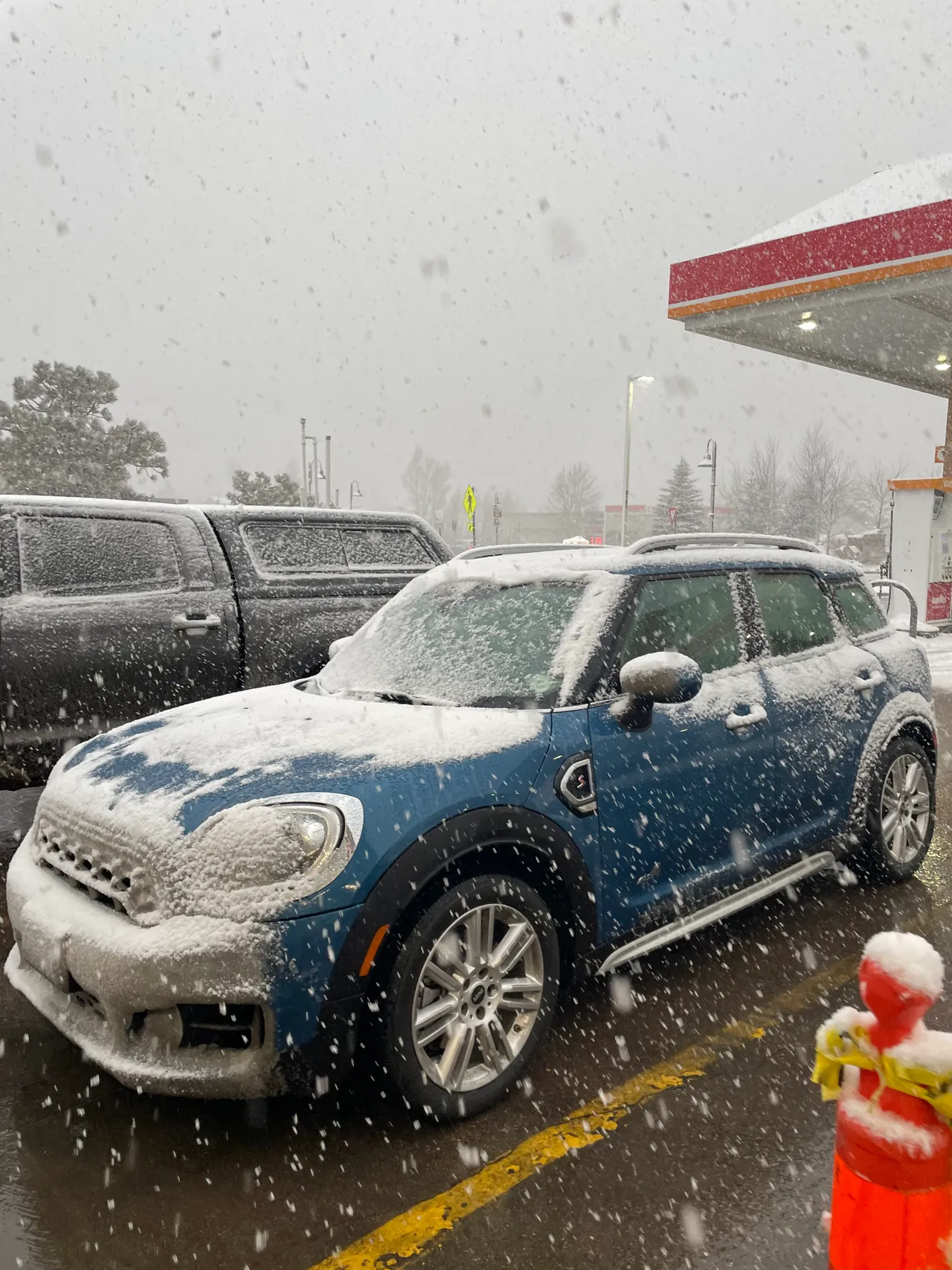 Blue MINI Cooper S Countryman in the snow in Colorado
