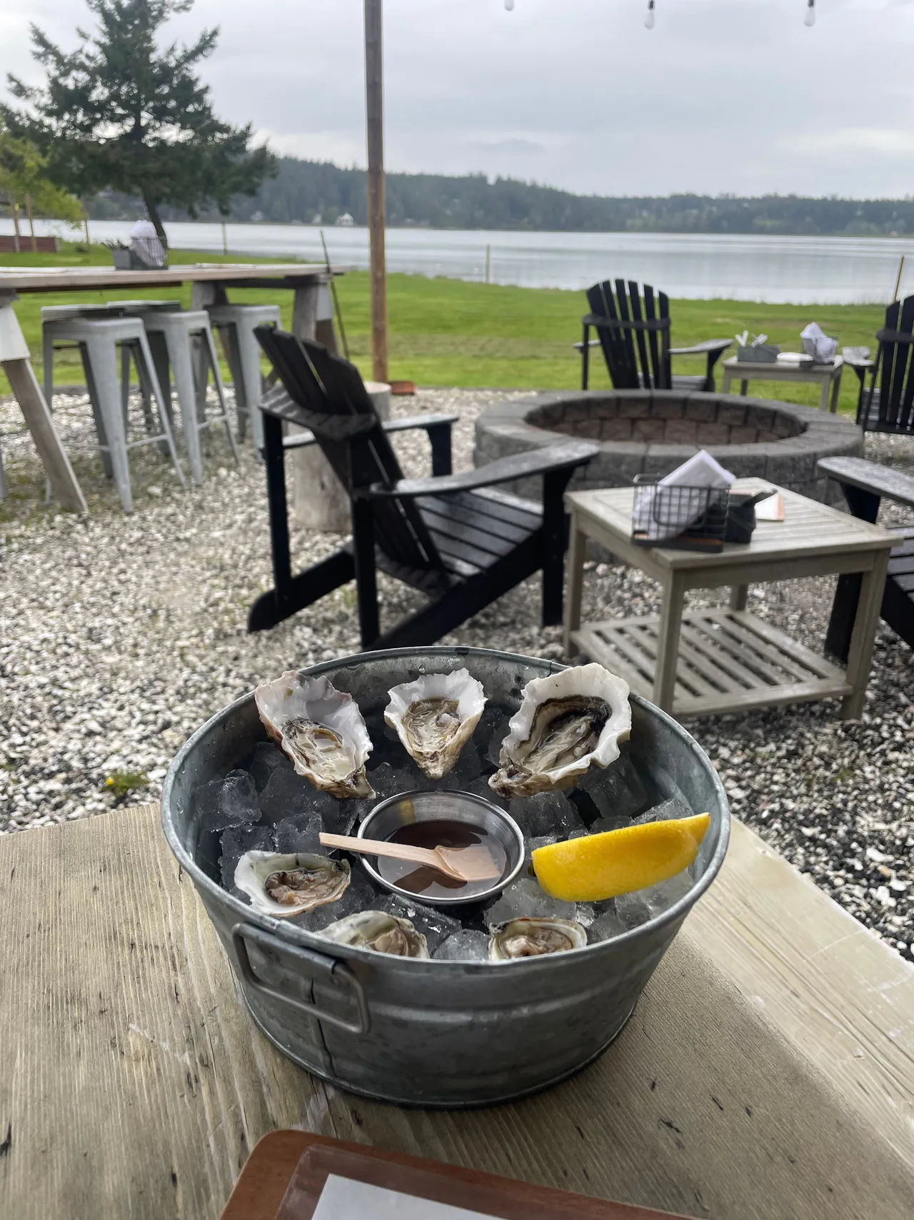 Fresh oysters on a waterfront patio on a Pacific Northwest island