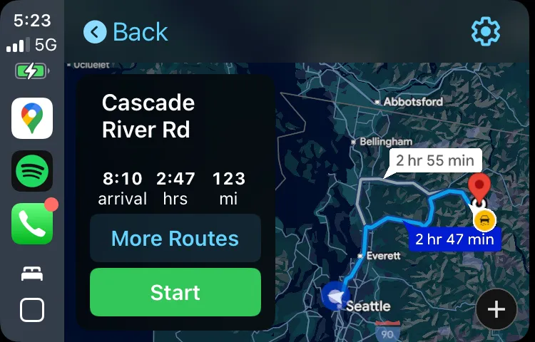 CarPlay navigation screen at 5:23 AM showing the route from Seattle to Cascade River Road — 123 miles, 2 hours 47 minutes