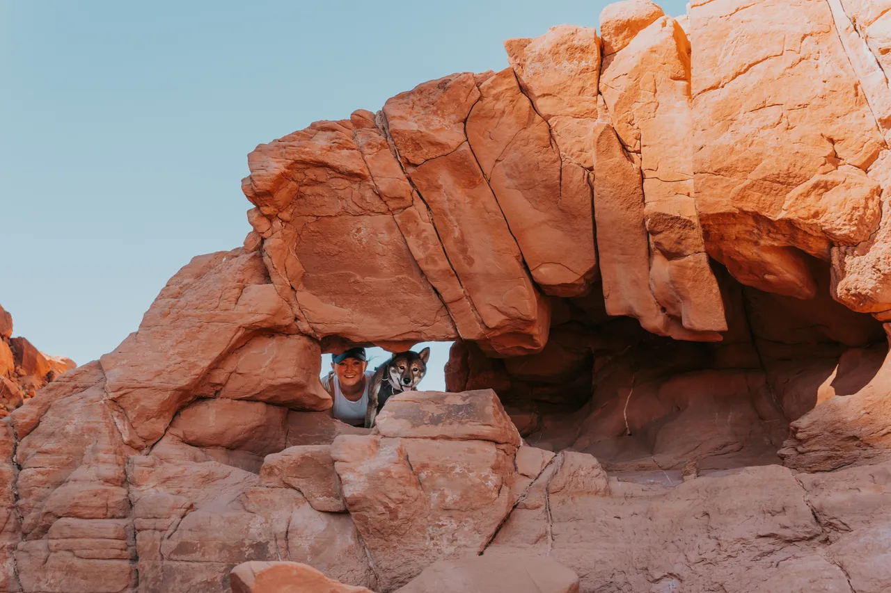 Sora and I squeezed into a natural rock arch at Valley of Fire