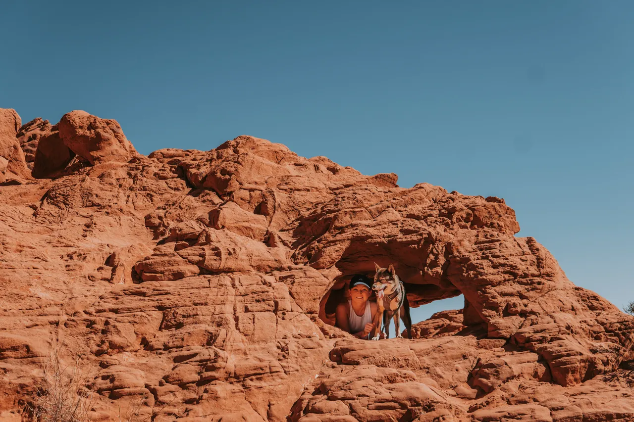 Peeking through a red rock arch with Sora at Valley of Fire State Park