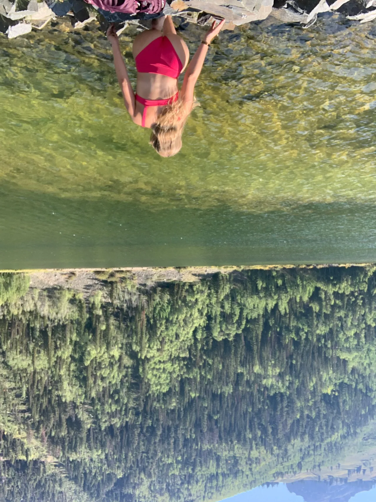Swimming in an alpine lake surrounded by mountains near Telluride, Colorado