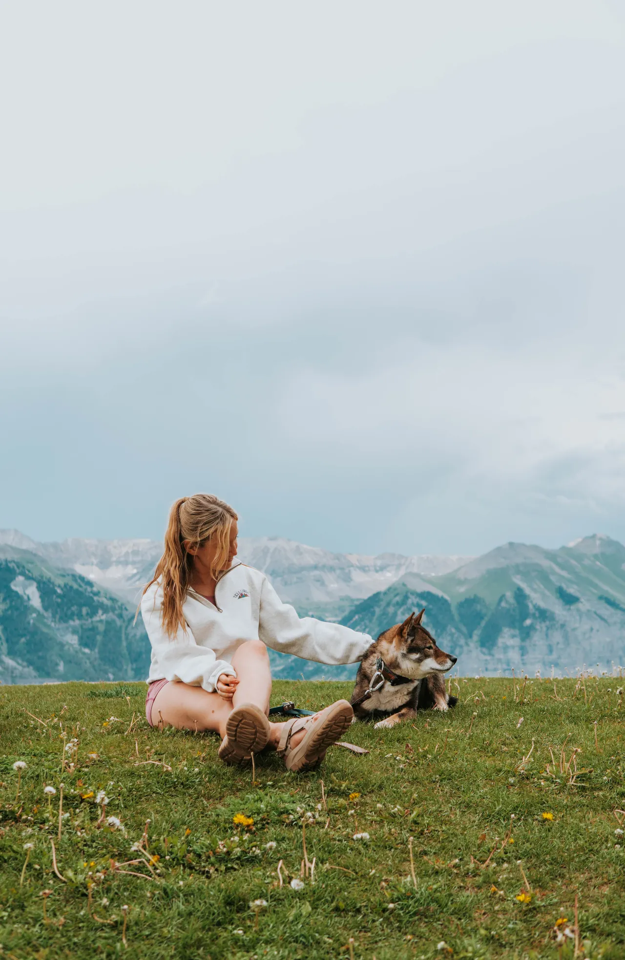 Sitting with Sora on a mountaintop overlooking the San Juan Mountains near Telluride