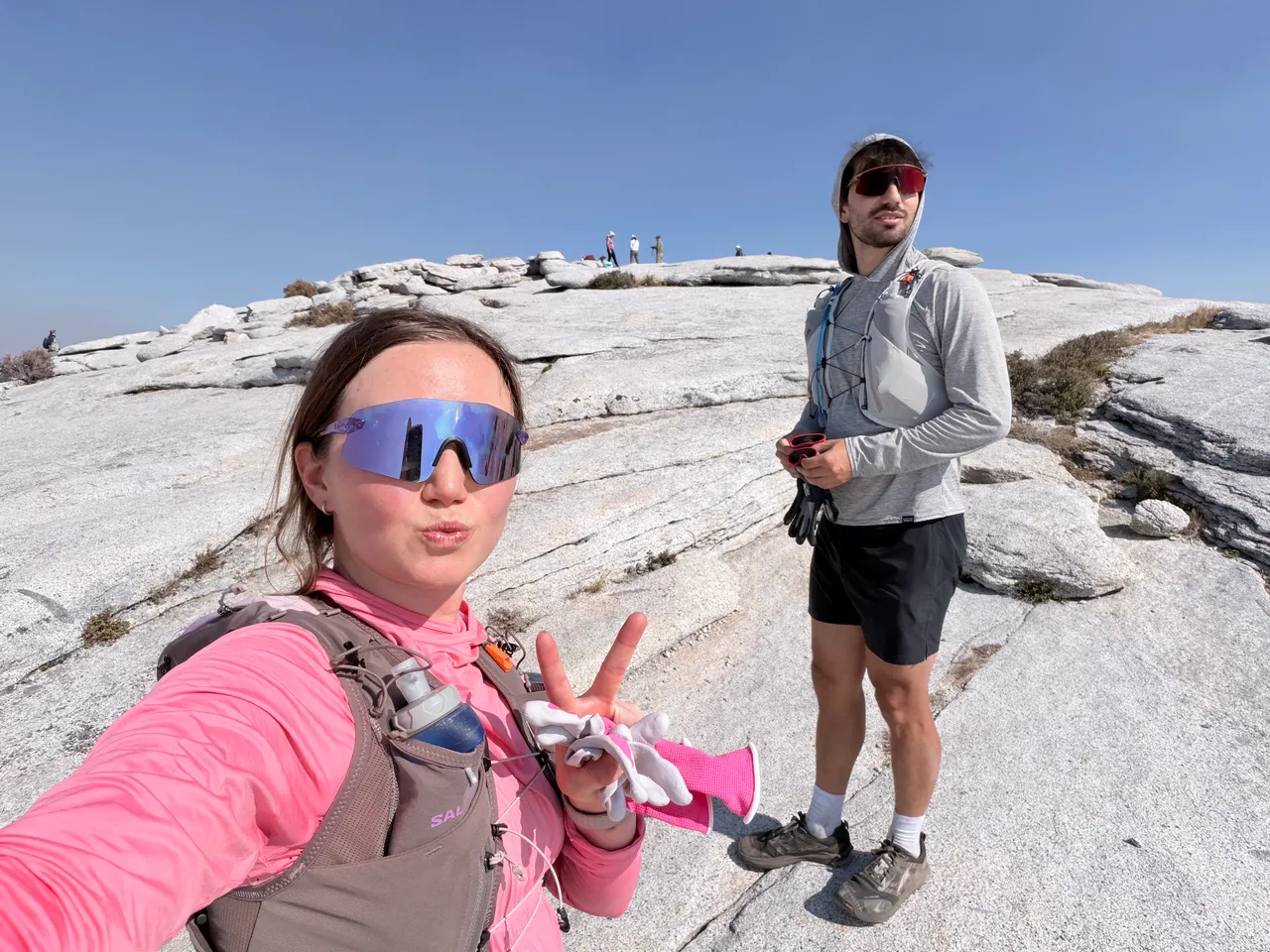 My partner and me on the granite summit of Half Dome