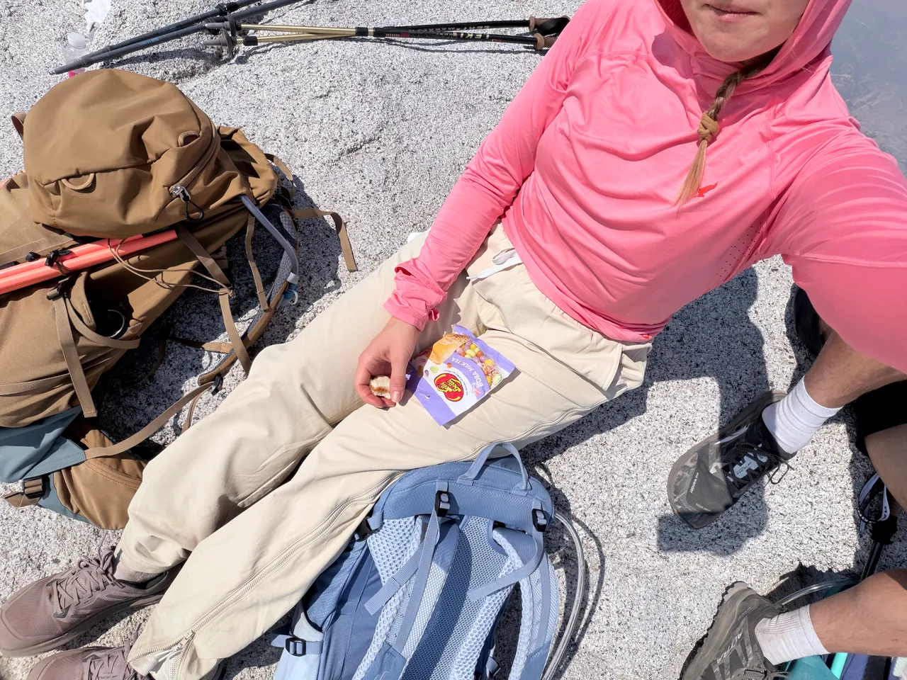 Taking a candy break with our hiking packs on Half Dome